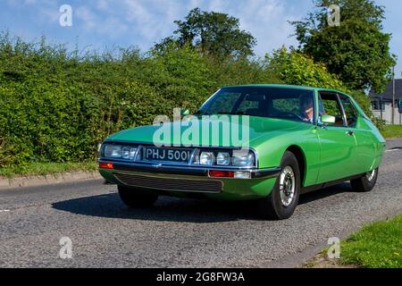 1972 70s verde Citroen SM 2dr guida a sinistra francese 2670cc benzina durante il tragitto per Capesthorne Hall Classic luglio mostra auto, Cheshire, Regno Unito Foto Stock