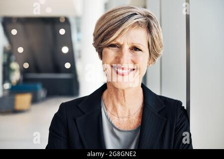 Faccia il vostro letto con lavoro duro e goda sdraiarsi sul successo Foto Stock