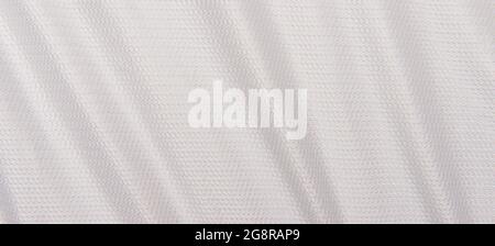 Calcio bianco, pallacanestro, pallavolo, hockey, rugby, lacrosse e pallamano jersey abbigliamento tessuto texture sport usura sfondo Foto Stock