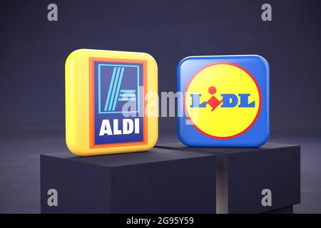 Aldi vs Lidl Concept: Logo dei due super mercati a prezzi competitivi su due piedistallo. Foto Stock