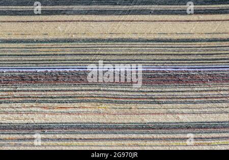 Texture dei bordi del libro, vista laterale della pila di fogli per lo sfondo e lo sfondo Foto Stock