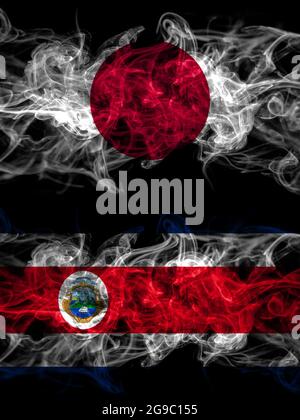 Bandiere di fumo di Giappone, Giappone e Costa Rica, cappotto Foto Stock