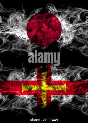 Bandiere di fumo di Giappone, Giappone e Regno Unito, Gran Bretagna, Gran Bretagna, Guernsey Foto Stock