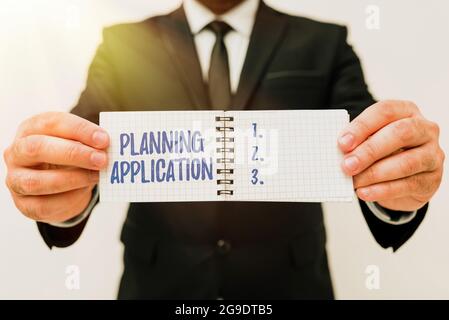 Applicazione di pianificazione delle didascalie concettuali. Richiesta di concetto di business a un'autorità locale per il permesso di costruire nuovi piani e idee di presentazione Foto Stock