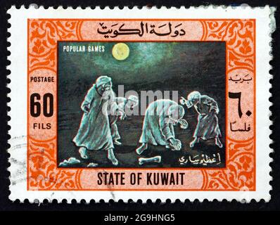 KUWAIT - CIRCA 1977: Un francobollo stampato nel Kuwait mostra Treasure Hunt, gioco popolare, circa 1977 Foto Stock