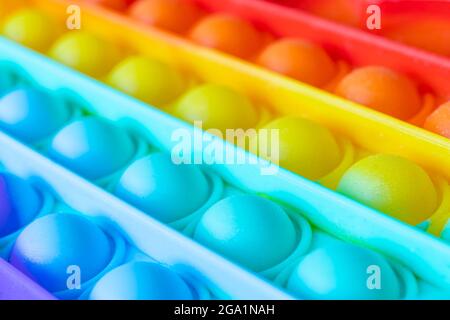 Colorato antistress sensoriale fidget push pop IT Push pop bolla flessibile fidget sensoriale giocattolo fornire scarico e sono buone per lo sviluppo di k Foto Stock