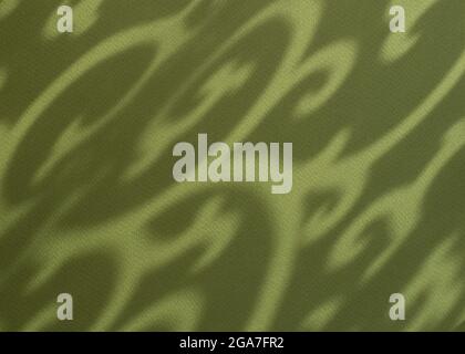 Ombra ornamentale astratta su sfondo di carta verde. Modello etnico irregolare. Primo piano. Foto Stock