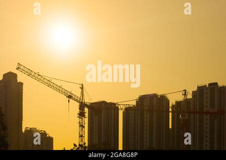 Cantiere a Hong Kong al tramonto Foto Stock