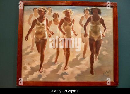Donna che corre su un dipinto di spiaggia. Anno 1940. Foto Stock
