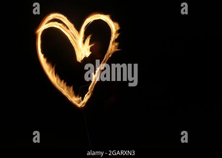 Un cuore sul fuoco Foto Stock