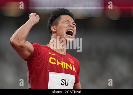 01 agosto 2021, Giappone, Tokio: Atletica: Olimpiadi, 100m, uomini, Calore preliminare, Bingtian su della Cina. Foto: Michael Kappeler/dpa Foto Stock