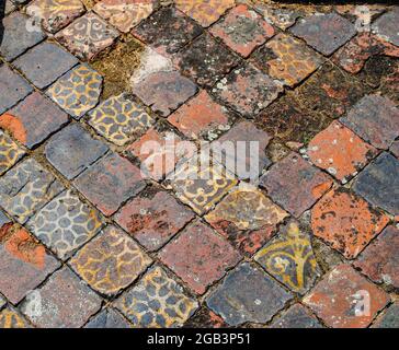 Buildwas Abbey Shropshire pietra piastrelle medaglia Foto Stock