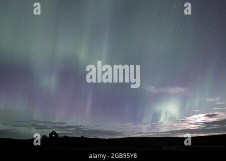 Aurora boreale (Aurora Borealis), rifugio Joekulheimar Highland, vicino a Vatnajoekull, Altopiani islandesi, Islanda Foto Stock