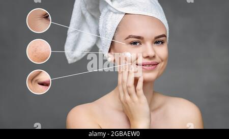 Donna che applica moisturizer sul viso per imperfezione della pelle e rughe Foto Stock