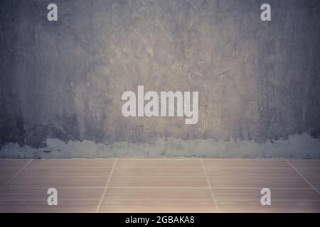 Parete in cemento grigio e fondo in ceramica arancione Foto Stock