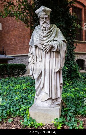 Statua nel giardino del Collegium Maius, è la sede del Museo dell'Università Jagellonica a Cracovia, Polonia Foto Stock