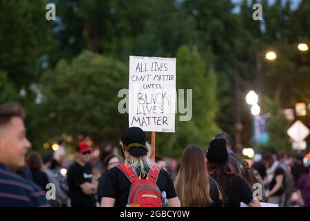 segno durante una protesta nera della materia di vite Foto Stock