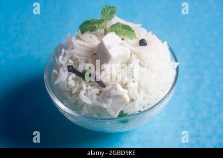 Pulav o Pulao, ottenuto con riso basmathi, recipiente in vetro Foto Stock