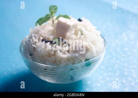 Pulav o Pulao, ottenuto con riso basmathi, recipiente in vetro Foto Stock