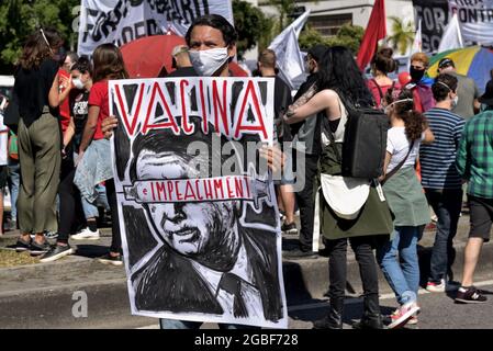 24 luglio 2021: I manifestanti brasiliani hanno marciato attraverso il cuore di Rio de Janeiro per dire al presidente di estrema destra, Jair Bolsonaro, che lo vogliono uscire. Foto Stock