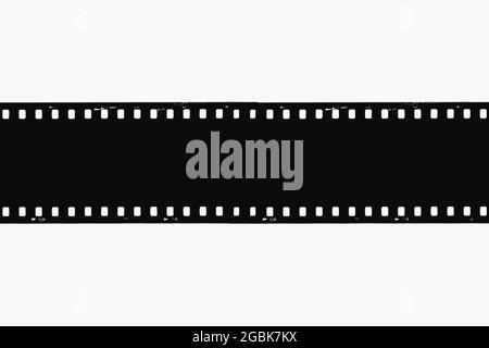 Una striscia di pellicola usata da 35 mm con percorsi di taglio Foto Stock