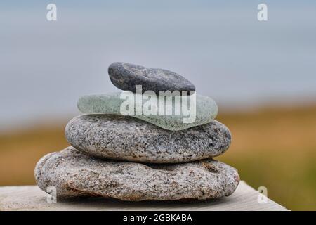 Pila di ciottoli a Chanonry Point, la Black Isle, Scozia Foto Stock