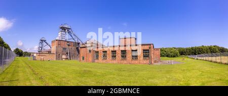 Edifici industriali conservati presso il Woodhorn Colliery, un'industria mineraria all'aperto e un museo dello stile di vita locale nel Northumberland, nel nord-est dell'Inghilterra Foto Stock