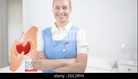 Composizione di donare il testo del sangue sul medico sorridente Foto Stock