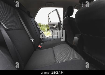 Sedili posteriori lato passeggero. Abitacolo della vettura Foto Stock
