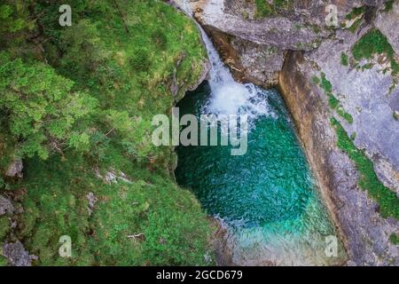 The waterfall view from the Marienbrucke Bridge in Germany a trail that leads to the view of the famous Neuschwanstein Castle in Germany. Stock Photo