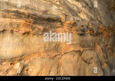 naturale color arancio texture di rocce di arenaria in montagna sfondo astratto Foto Stock