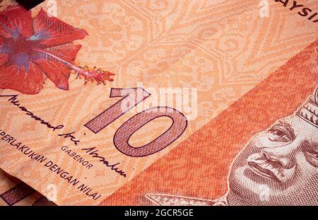 Macro primo piano di 10 Ringgit malese. Estremo primo piano della RM10 Malesia. Ritratto del primo Re o Agong della Malesia. Primo piano della valuta cartacea Foto Stock