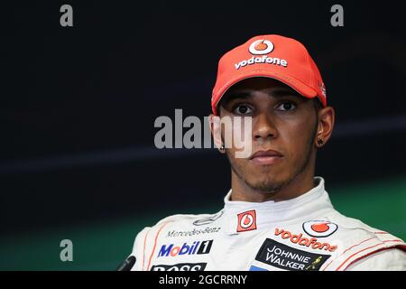 Secondo classificato Lewis Hamilton (GBR) McLaren nel post di qualificazione della FIA Press Conference. Gran Premio d'Europa, sabato 23 giugno 2012. Valencia, Spagna. Foto Stock