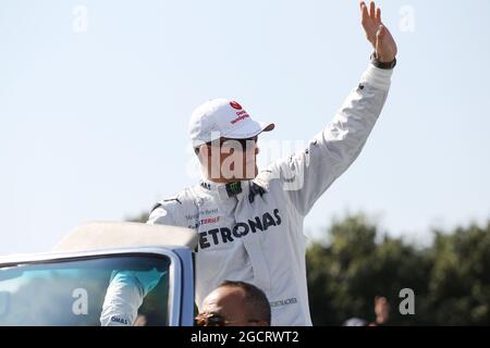 Michael Schumacher (GER) Mercedes AMG F1 sulla sfilata dei piloti. Gran Premio del Giappone, domenica 7 ottobre 2012. Suzuka, Giappone. Foto Stock