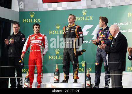 Il podio (da L a R): Fernando Alonso (ESP) Ferrari, secondo; Kimi Raikkonen (fin) Lotus F1 Team, vincitore di gara; Sebastian Vettel (GER) Red Bull Racing, terzo. Gran Premio d'Australia, domenica 17 marzo 2013. Albert Park, Melbourne, Australia. Foto Stock