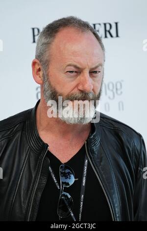 Liam Cunningham (IRE) attore all'Amber Lounge Fashion Show di Monaco Grand Prix, venerdì 24 maggio 2013. Monte Carlo, Monaco. Foto Stock