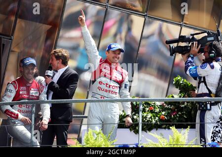 02 Audi Sport Team Joest Audi R18 e-tron quattro Hybrid festeggia sul podio il vincitore della gara Marcel Fassler (sui). Campionato Mondiale FIA Endurance, ore 24 le Mans, gara, domenica 15 giugno 2014. Le Mans, Francia. Foto Stock