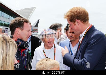 (Da L a R): Christian Horner (GBR) Red Bull Racing Team Principal con Jackie Stewart (GBR); Mark Stewart (GBR); e HRH Prince Harry (GBR) in griglia. Gran Premio di Gran Bretagna, domenica 6 luglio 2014. Silverstone, Inghilterra. Foto Stock