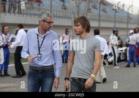 (Da L a R): Alessandro Alunni Bravi (ITA) driver Manager con Charles Pic (fra) Lotus F1 Team terzo pilota in griglia. Campionato Mondiale FIA Endurance, turno 7, sabato 15 novembre 2014. Sakhir, Bahrein. Foto Stock