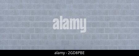 Parete esterna grigio chiaro in pietre di cemento quadrate Foto Stock