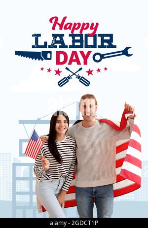 Biglietto d'auguri per l'Happy Labor Day con i giovani che detengono bandiere USA Foto Stock