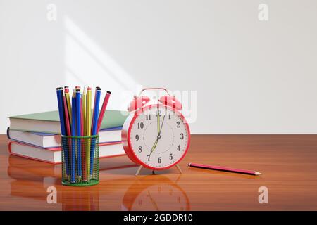 Sveglia, matite e libri. Concetto di ritorno a scuola. illustrazione 3d. Foto Stock