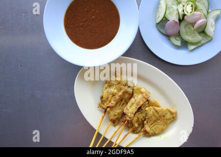 La carne di maiale Satay Foto Stock