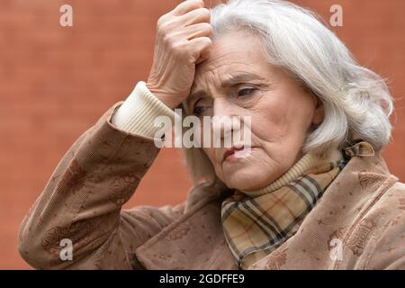 Close up ritratto di triste malato donna senior Foto Stock