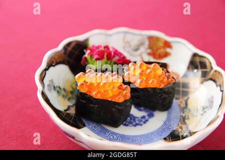Uova di salmone Ikura Foto Stock