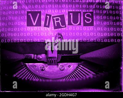 Virus visualizzato su una macchina da scrivere vintage Foto Stock