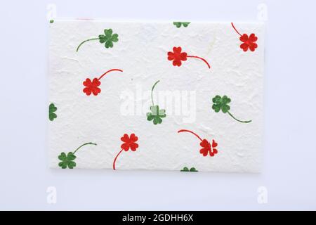 cloverleaf su sfondo di carta Mulberry Foto Stock