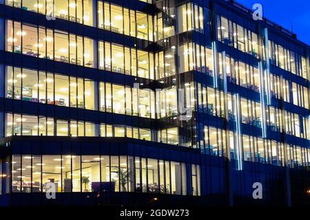 Glass facade of modern building in Krakow, Poland. Stock Photo