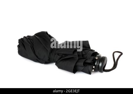 Ombrello nero su sfondo bianco Foto Stock