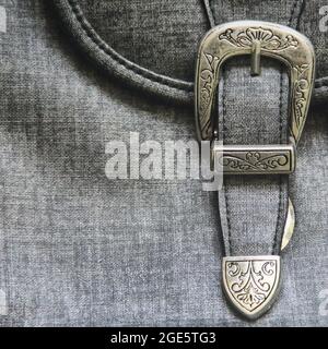 Sfondo tessuto. Chiusura della cintura di sicurezza. Foto Stock